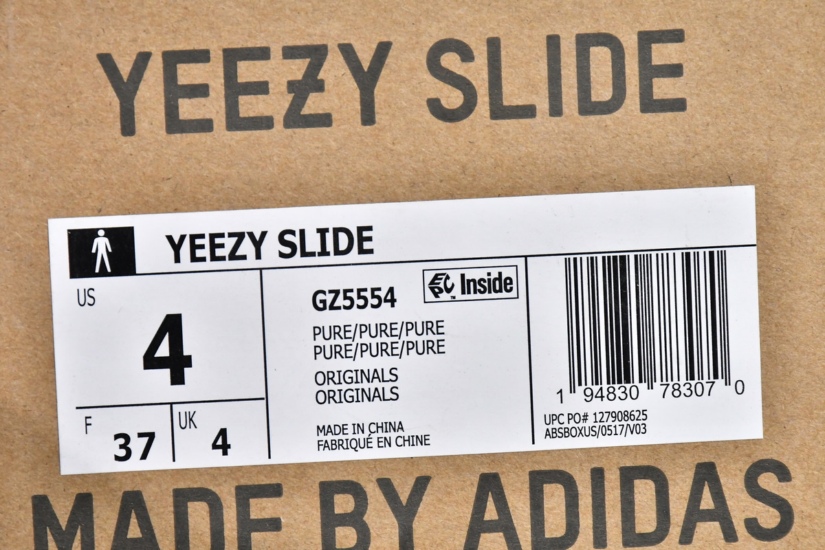 Adidas Yeezy Slides 'Pure' GZ5554 - Sleek and Comfortable Footwear Adidas Yeezy Slides 'Pure' GZ5554 - Sleek and Comfortable Footwear
